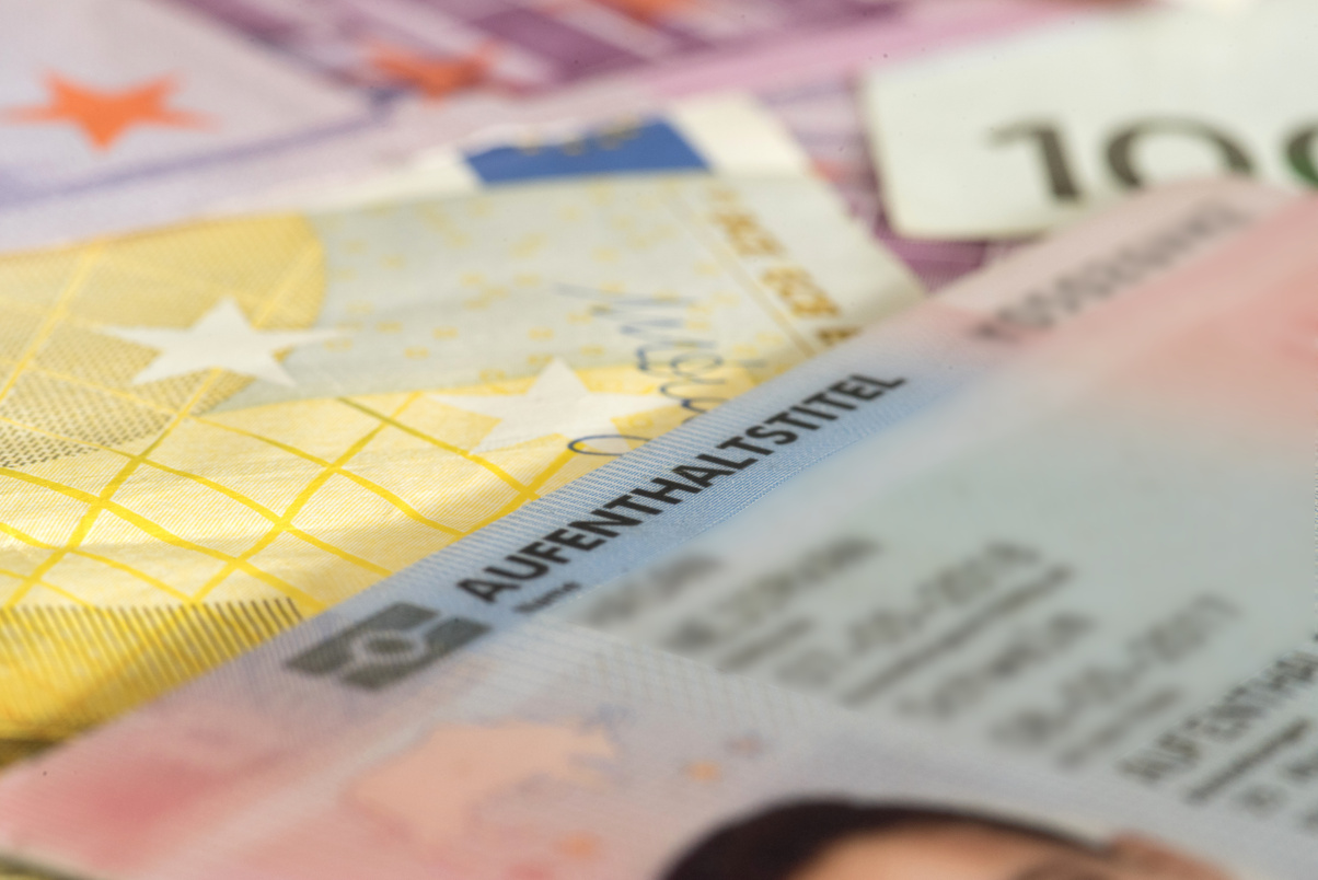 Euro banknotes and residence permit for Germany